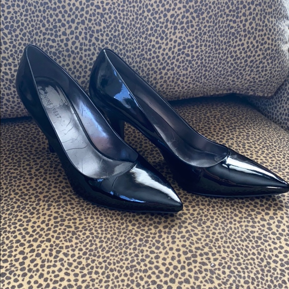 Black patent leather pumps